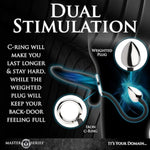 Tug + Plug Cock Ring With Anal Plug For Men & Couples. Premium Flexible Silicone Cord With Tapered Tip For Easier Insertion, Dual Stimulation, 1 Piece, Black & Silver.