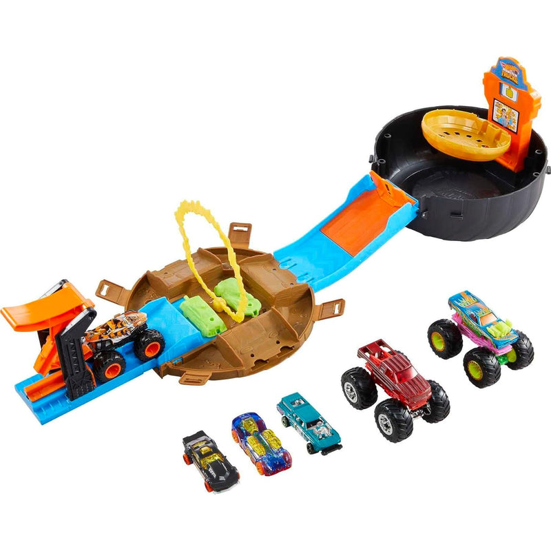 Hot Wheels Toy Monster Trucks Playset, Tire-Shaped Case Transforms into Rac